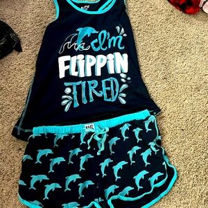 Dark blue and light blue “I’m flipping tired pajama set 1 is S and 2 is XS.
